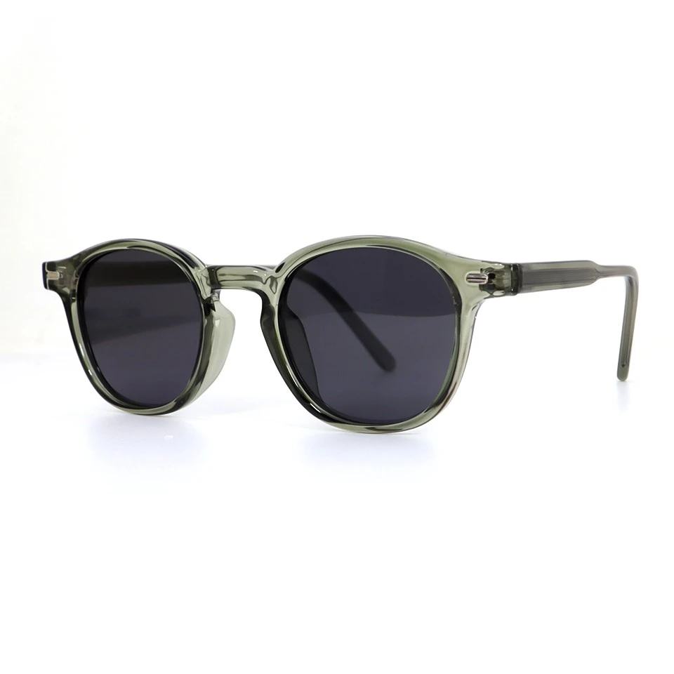 Three-quarter view of custom round acetate sunglasses with dark polarized lenses